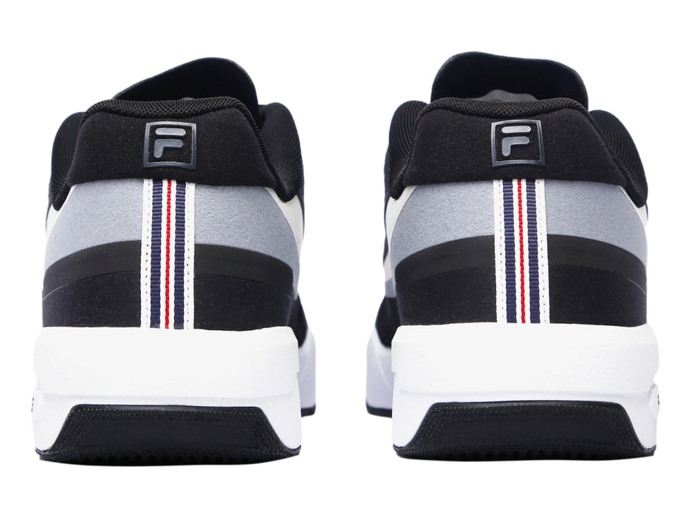 Tenis deportivos FILA FX-25 en color negro con detalles en gris y suela blanca, vista lateral.
