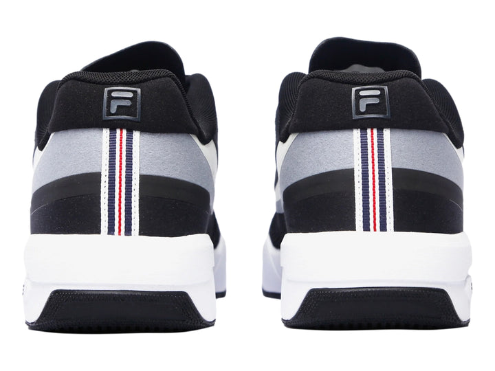 Tenis deportivos FILA FX-25 en color negro con detalles en gris y suela blanca, vista lateral.