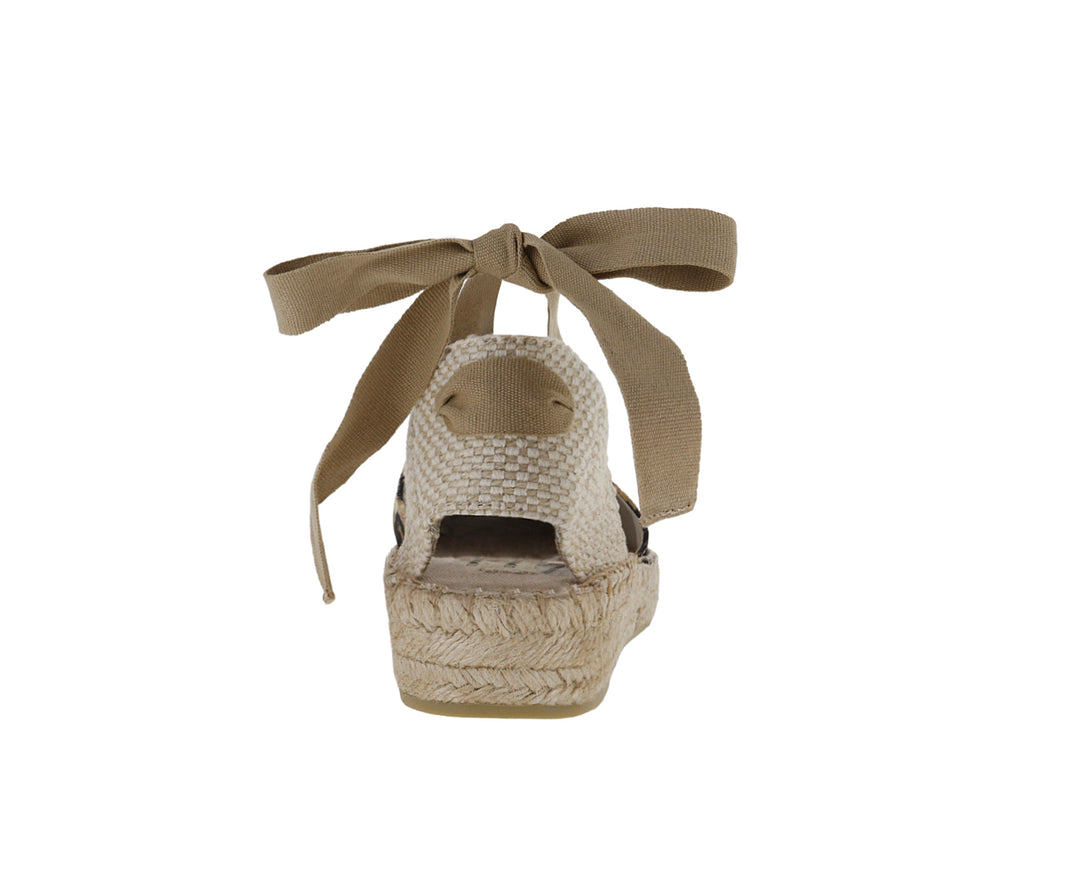 Alpargata para mujer con estampado de leopardo, suela de yute y lazos beige.