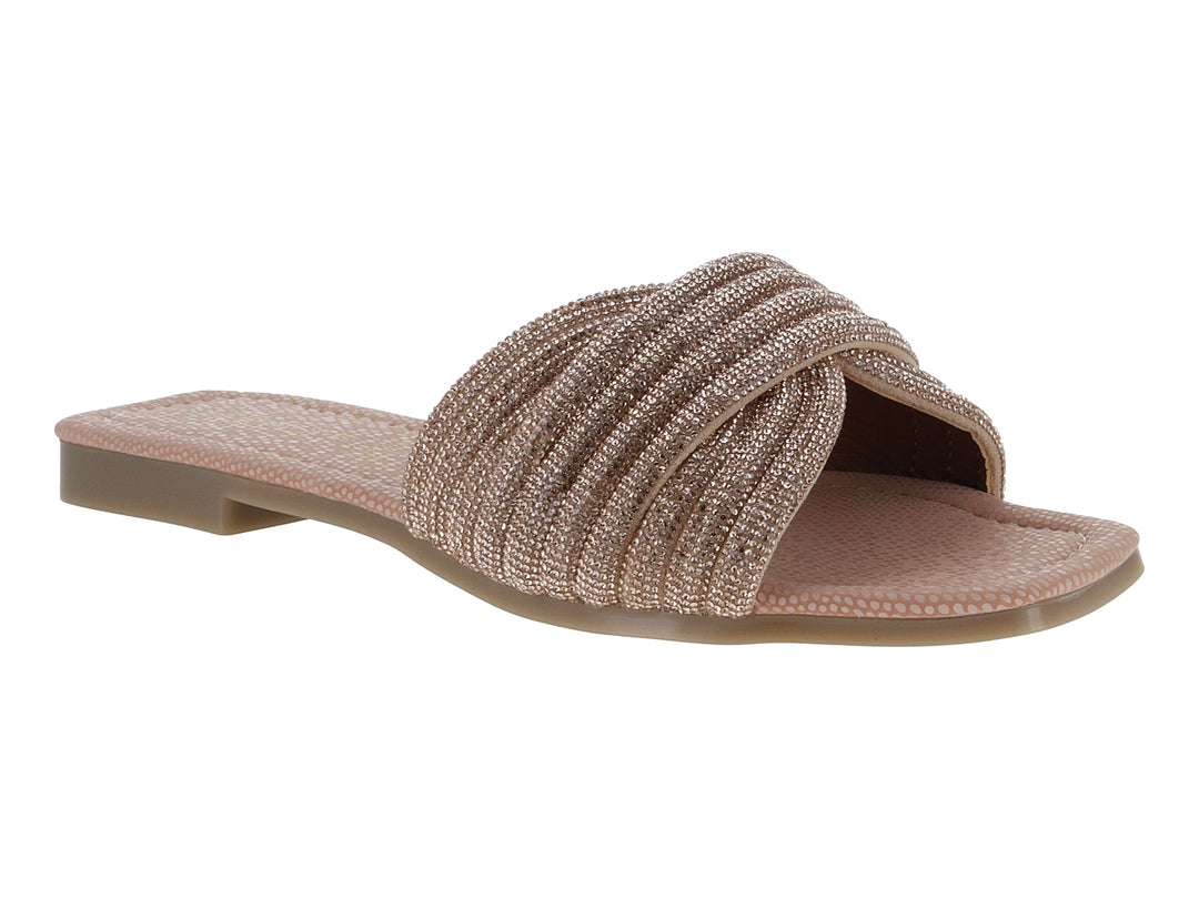 Sandalia plana para niña en color oro rosado con correa trenzada y acabado brillante.