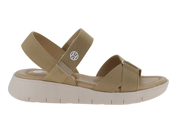 Sandalia Hispana color beige con plataforma, correas elásticas y cierre ajustable en el tobillo.