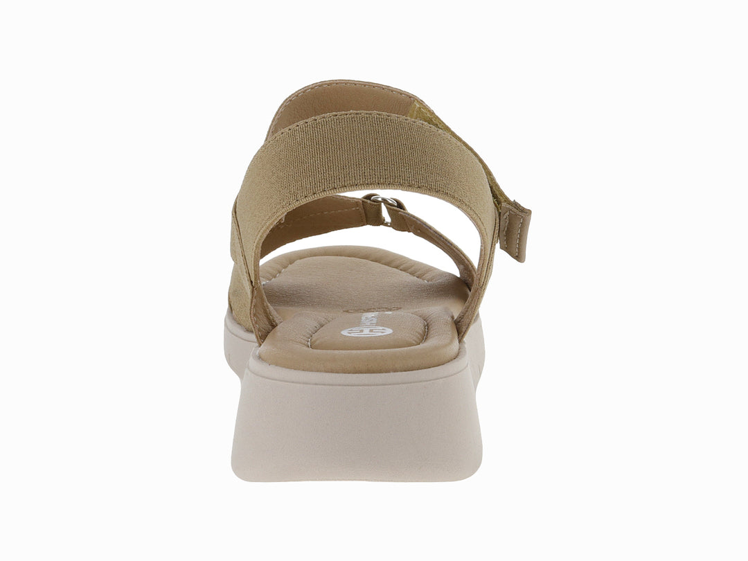 Sandalia Hispana color beige con plataforma, correas elásticas y cierre ajustable en el tobillo.