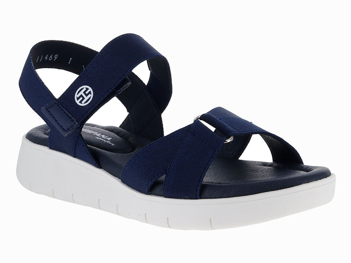 Sandalia Hispana color azul marino con suela blanca de plataforma y correas elásticas.