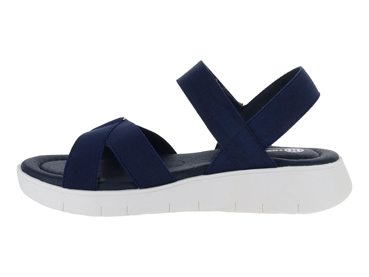 Sandalia Hispana color azul marino con suela blanca de plataforma y correas elásticas.