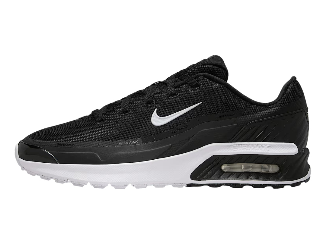 Tenis deportivos Nike Air Max en color negro con suela blanca y logotipo lateral blanco.