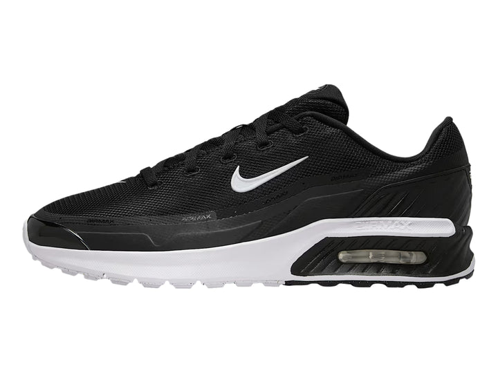 Tenis deportivos Nike Air Max en color negro con suela blanca y logotipo lateral blanco.