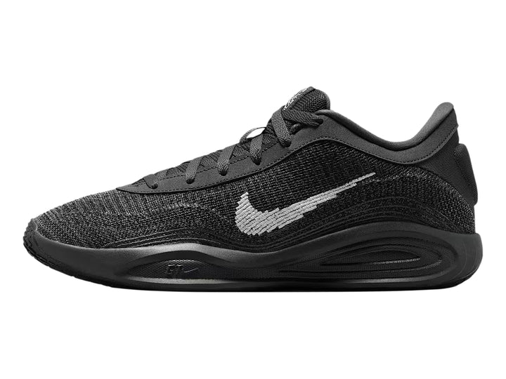 Tenis de baloncesto Nike GT Hustle Academy en color gris oscuro y negro con el logotipo de Nike en blanco.