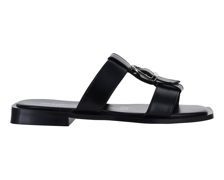 Sandalias negras para mujer de la marca Senties con diseño plano y hebilla metálica.