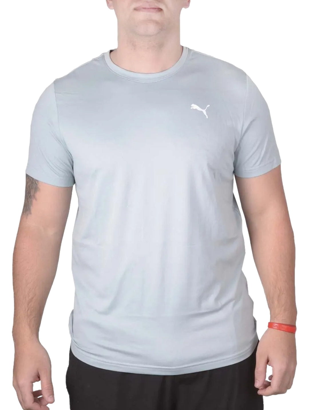 Playera Puma color verde musgo claro para hombre con logotipo blanco en el pecho.