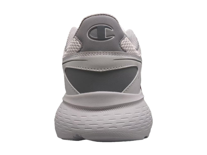 Tenis deportivos Champion color gris con tejido de malla y suela robusta.