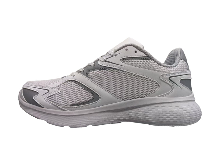 Tenis deportivos Champion color gris con tejido de malla y suela robusta.