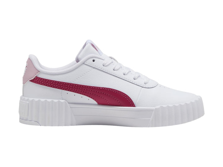 Tenis PUMA Carina 3.0 JR en color blanco con franja y talón en tono rosa y suela de plataforma blanca.