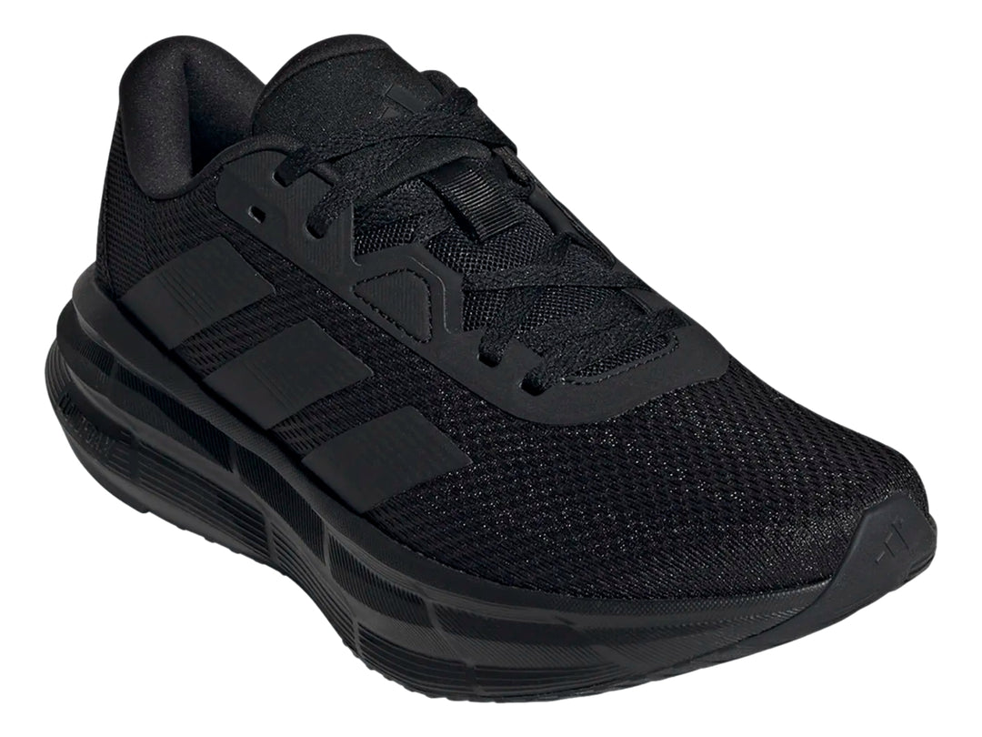 Tenis deportivos Adidas Galaxy 7 en color negro, vista lateral.