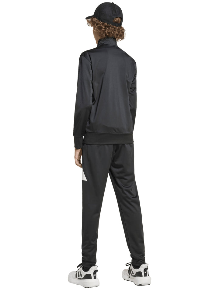 Conjunto deportivo Adidas para niños en color negro con detalles blancos, incluye chaqueta y pantalón.