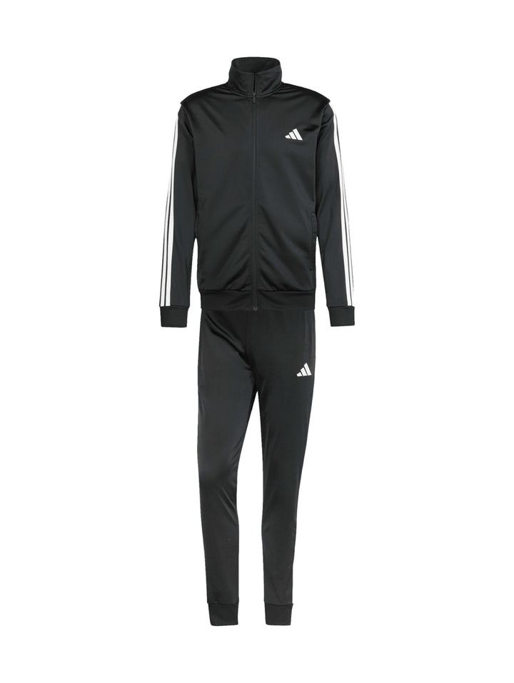 Conjunto deportivo Adidas negro compuesto por chaqueta y pantalón con tres franjas blancas laterales.