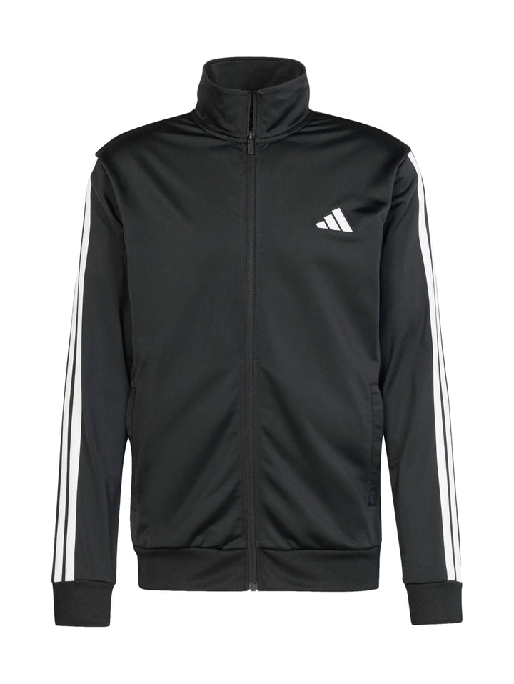 Conjunto deportivo Adidas negro compuesto por chaqueta y pantalón con tres franjas blancas laterales.