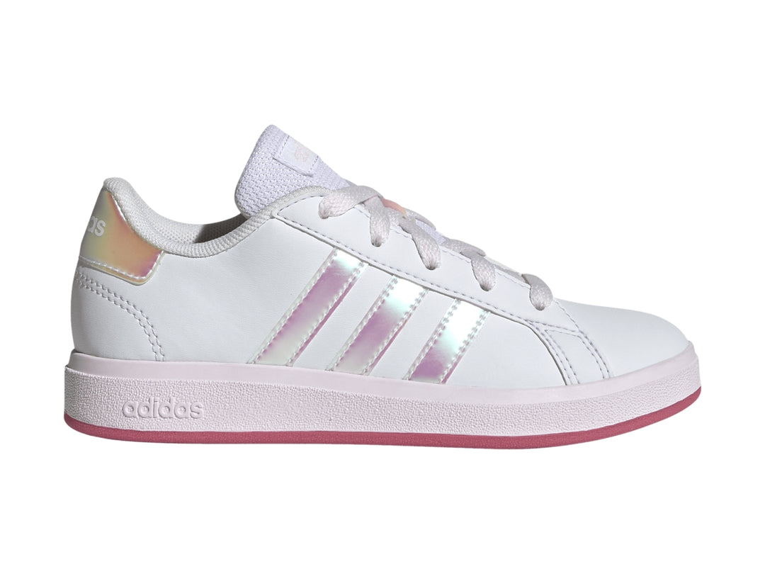 Tenis Adidas blancos con franjas iridiscentes y suela rosa.