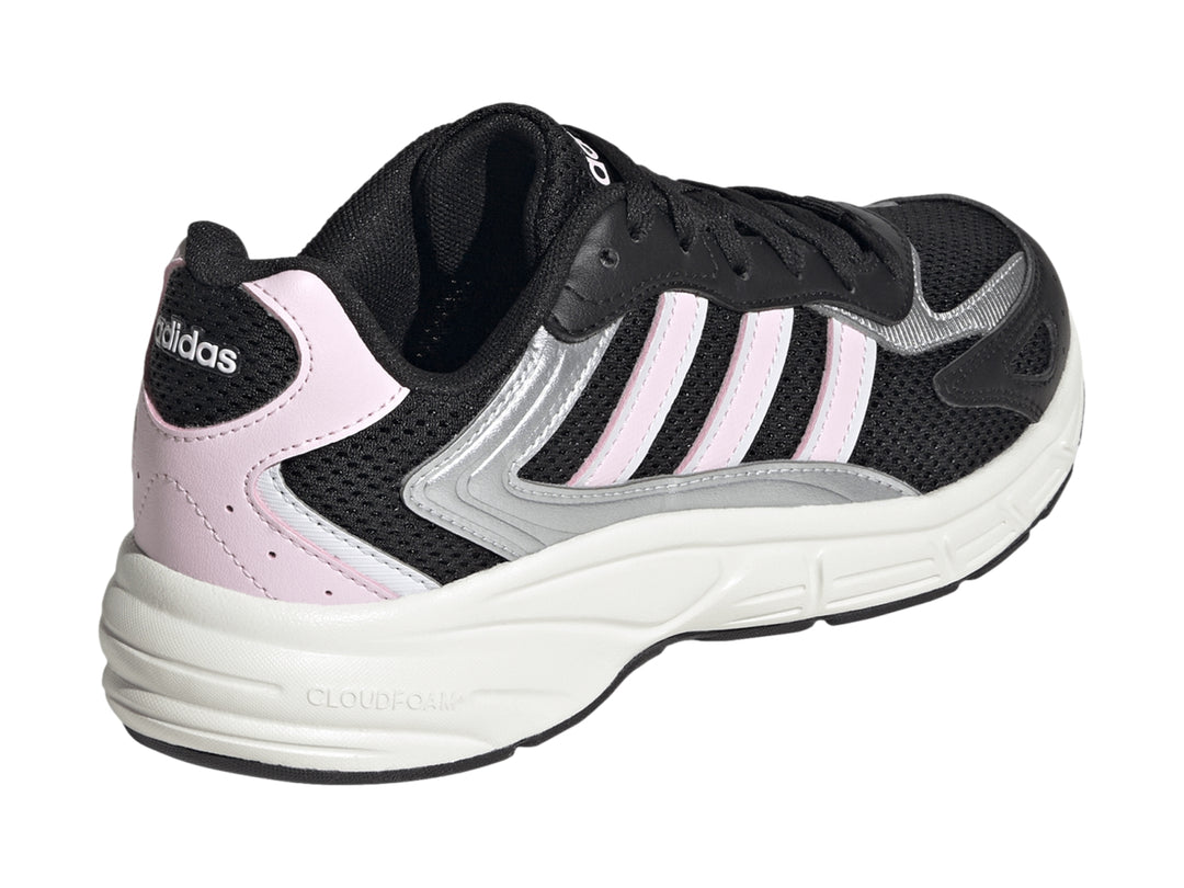 Tenis deportivos Adidas color negro con franjas rosas y suela blanca.