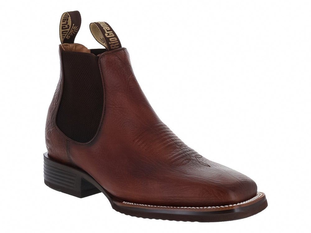 Bota vaquera Rio Grande color redwood para hombre con suela negra y elástico lateral.