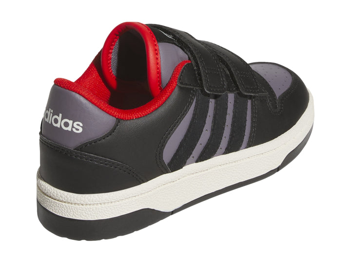 Tenis Adidas infantiles color negro y gris con cierres de velcro y suela blanca.