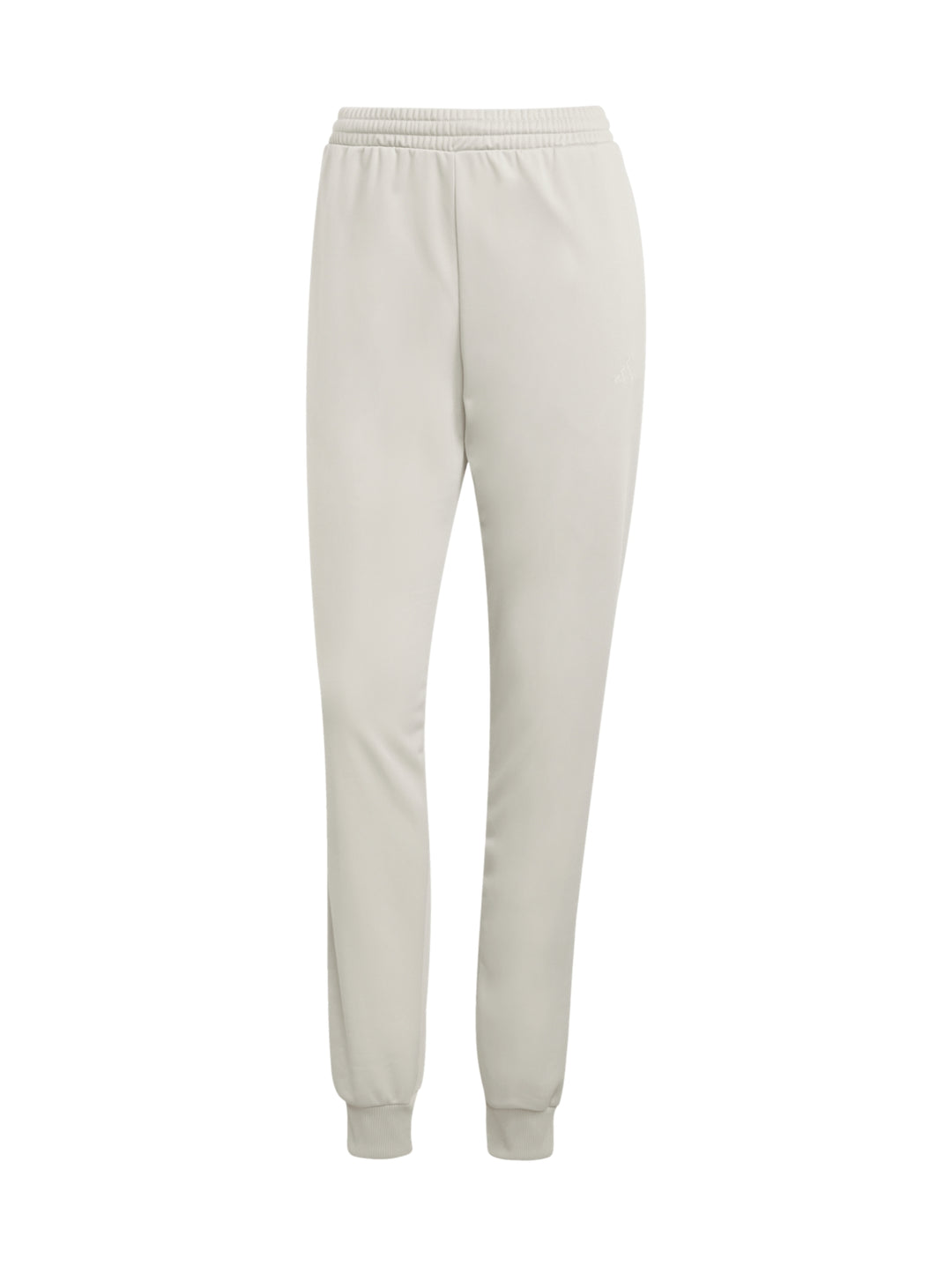 Conjunto deportivo Adidas Essentials Feel Cozy en color beige, compuesto por chaqueta y pantalón para mujer.