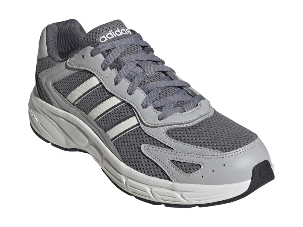 Tenis Adidas Eclyptix 2000 en color gris con detalles blancos y suela blanca.