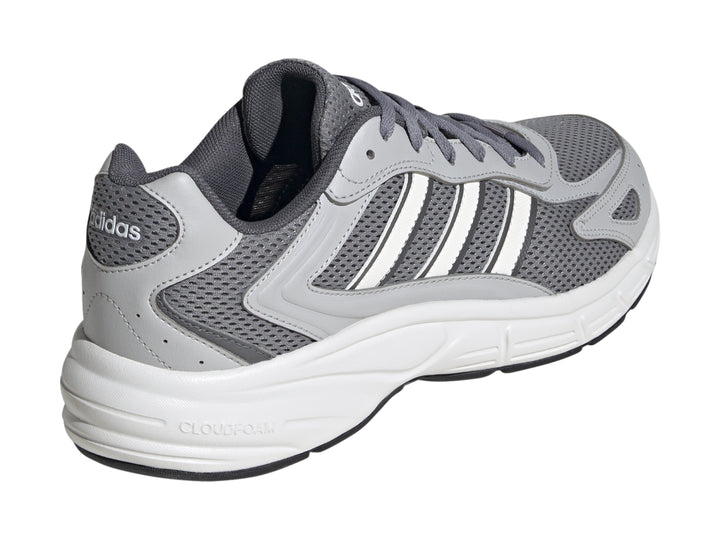 Tenis Adidas Eclyptix 2000 en color gris con detalles blancos y suela blanca.