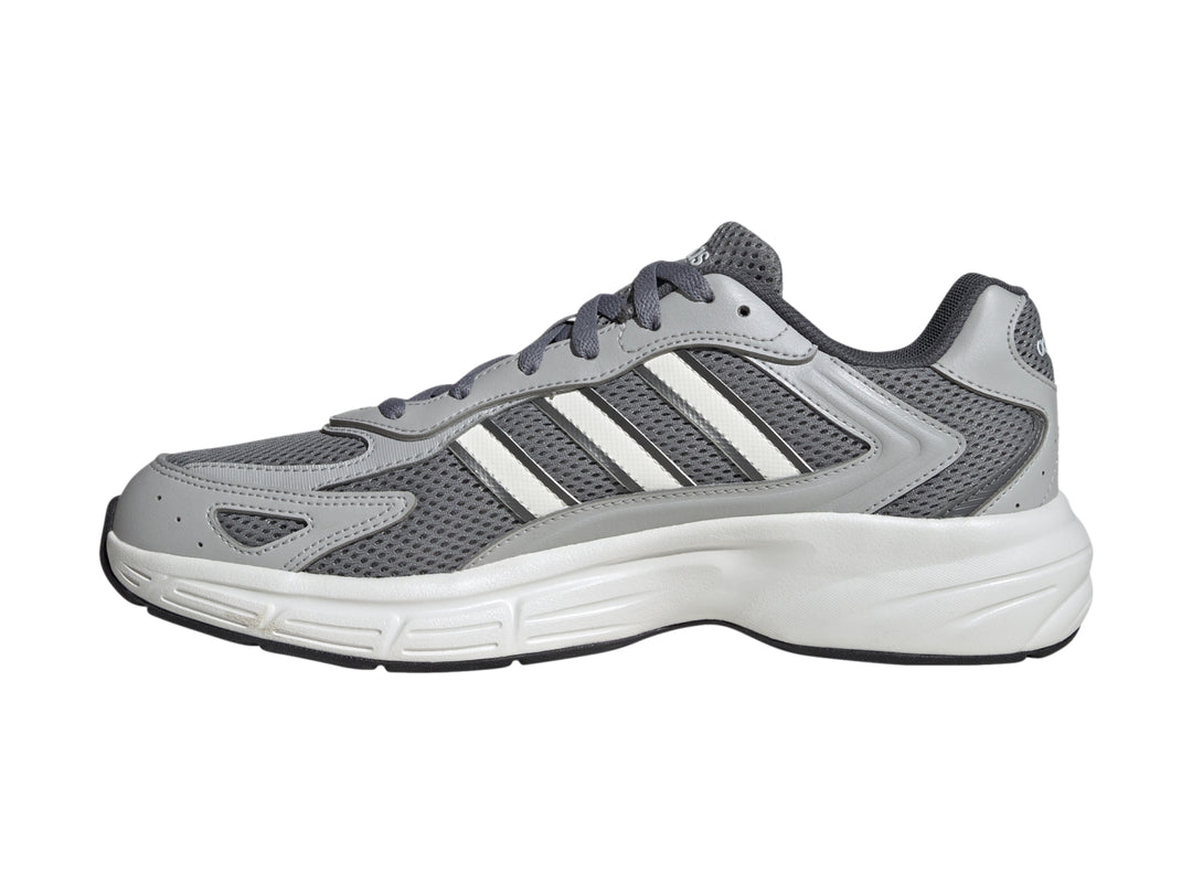 Tenis Adidas Eclyptix 2000 en color gris con detalles blancos y suela blanca.