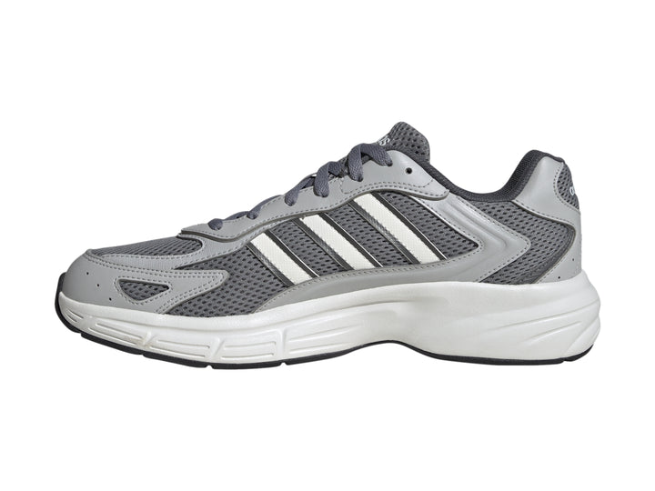 Tenis Adidas Eclyptix 2000 en color gris con detalles blancos y suela blanca.