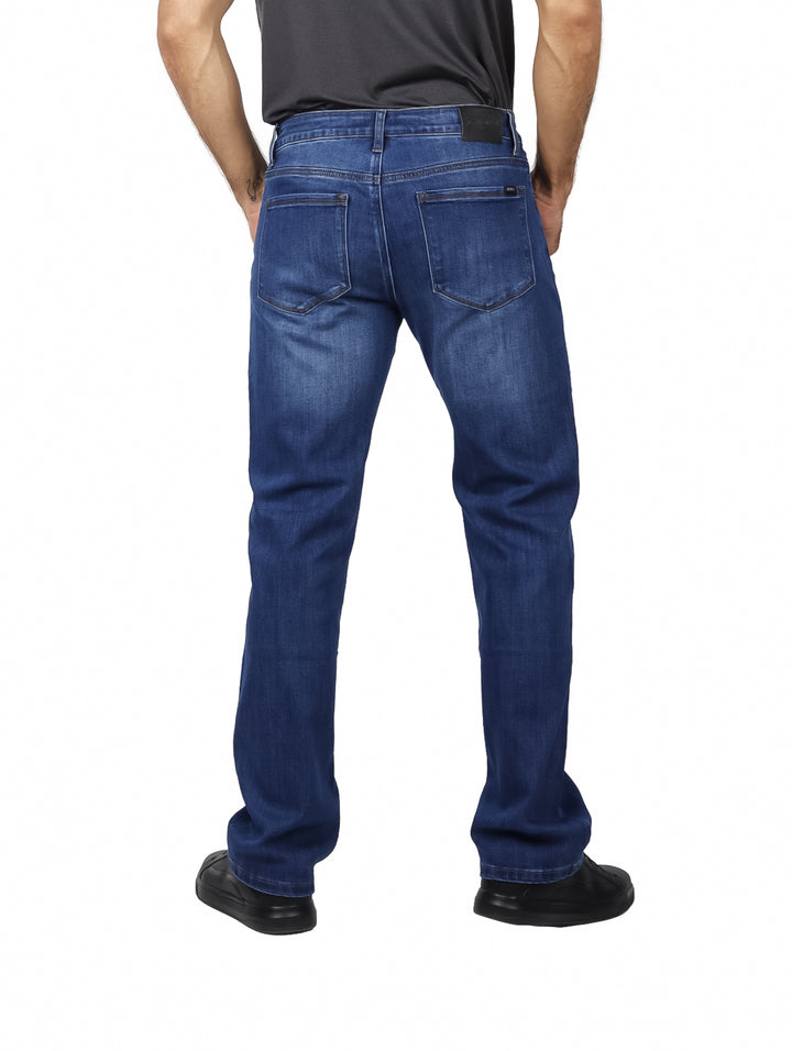 Pantalones jeans azul oscuro con efecto stone wash para hombre.