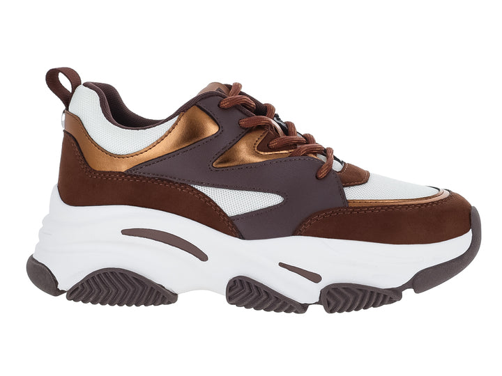 Tenis deportivos Steve Madden para niños en colores bronce, marrón y blanco con suela chunky.