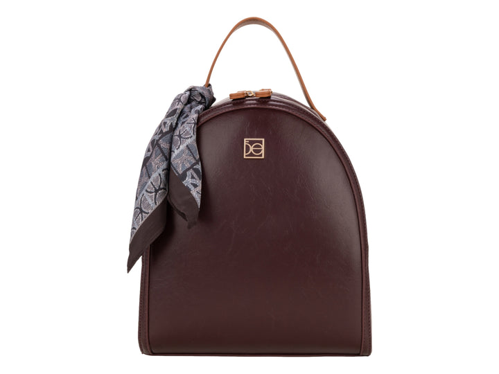 Mochila escolar Cloe color tinto con asa superior y un pañuelo decorativo gris.