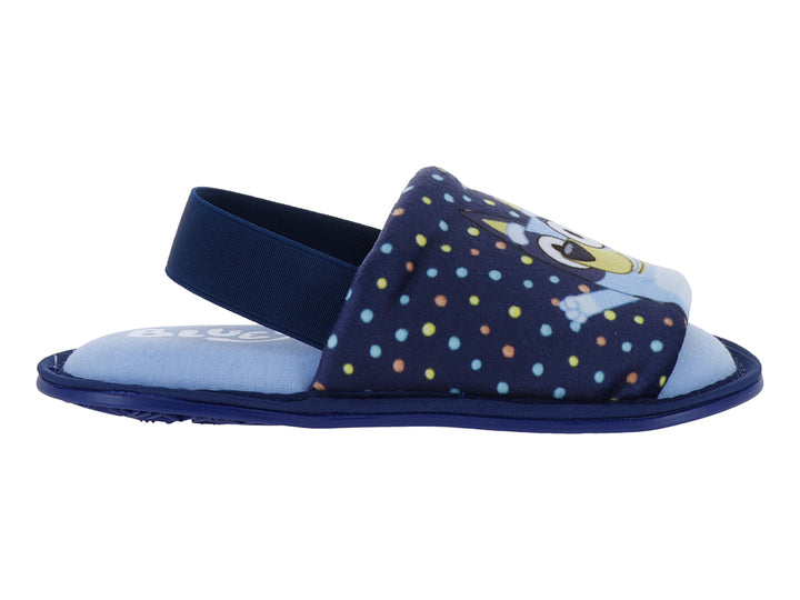 Pantufla azul de la marca ARRA con diseño de lunares coloridos y personaje en el empeine.
