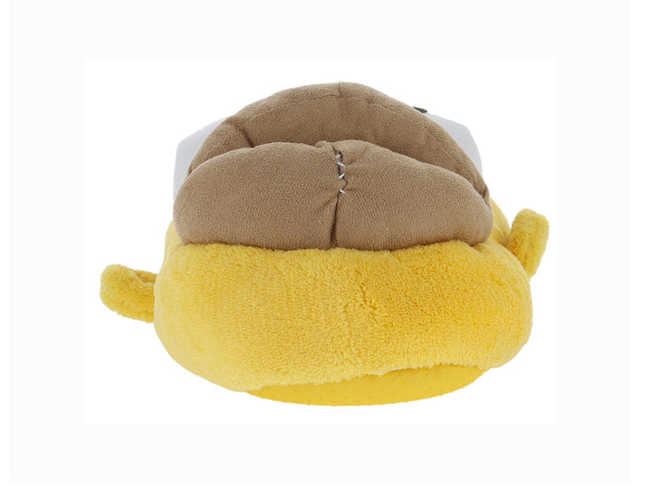 Pantufla amarilla de peluche con diseño de personaje y detalles en color café y blanco.