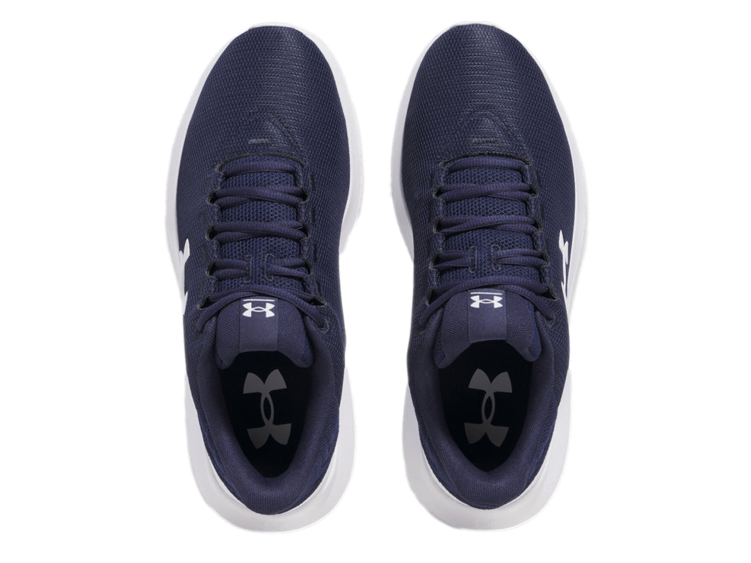 Tenis deportivos Under Armour en color azul marino con suela blanca y logotipo blanco lateral.