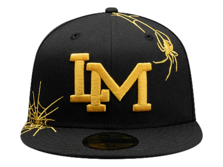 Gorra New Era negra con visera plana, bordado amarillo de letras &