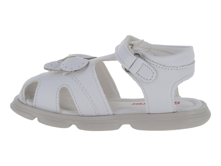 Sandalia blanca para niña con detalle de moño frontal y correa de ajuste con velcro.