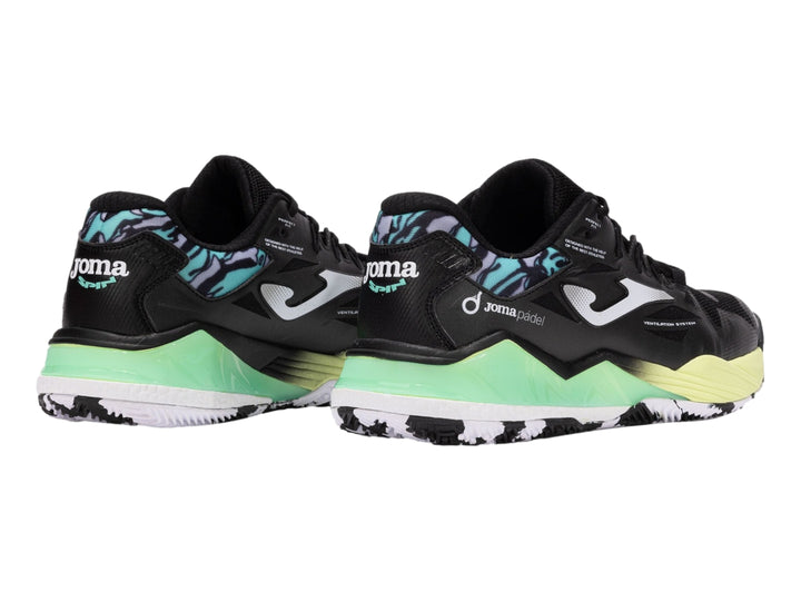 Tenis deportivos Joma color negro con suela en degradado verde lima y detalles azules en el talón.
