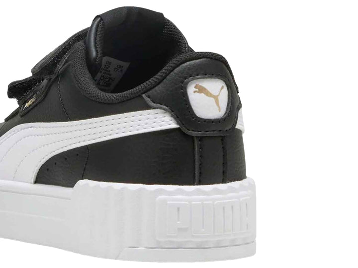 Tenis PUMA Carina 3.0 V PS en color negro con suela blanca de plataforma y cierre de velcro para niños.