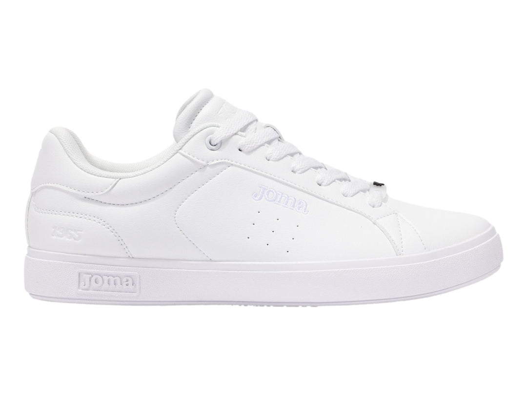 Tenis deportivos Joma para niño en color blanco total con agujetas y suela blanca.