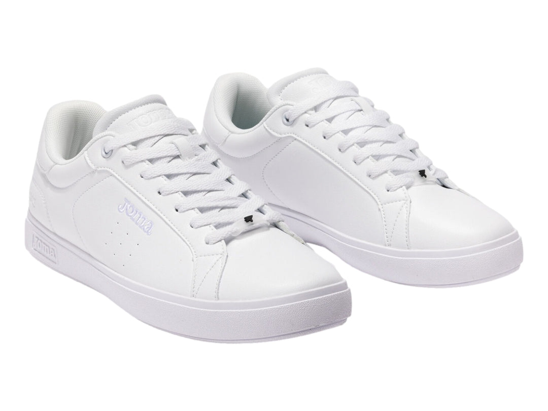 Tenis deportivos Joma para niño en color blanco total con agujetas y suela blanca.