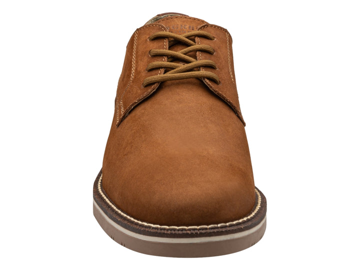 Zapato casual Dockers color cognac de cuero con cordones y suela plana blanca y café.