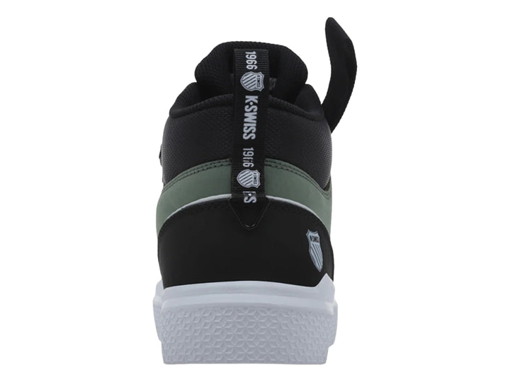 Tenis K-Swiss de corte medio en colores oliva, negro y blanco con correa ajustable en el tobillo.