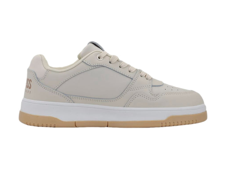 Tenis K-Swiss color taupe con suela blanca y base de goma color miel.