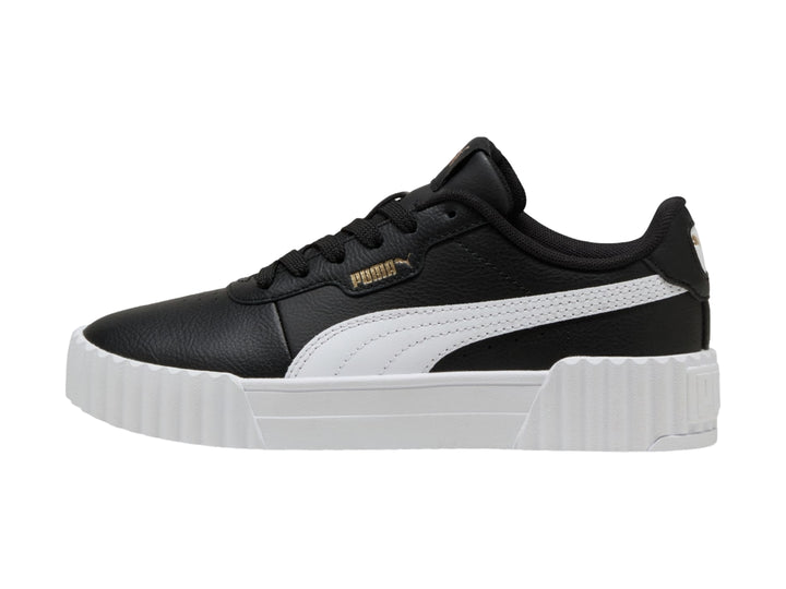 Tenis PUMA Carina 3.0 JR color negro con suela blanca de plataforma y detalles dorados.