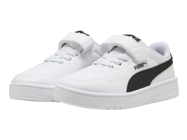 Tenis PUMA blancos para Niño con franja negra lateral y cierre de velcro.