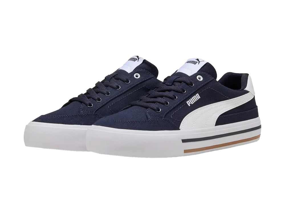 Tenis PUMA Court Classic Vulc en color azul marino con detalles y suela blanca.