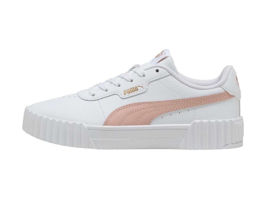 Tenis PUMA Carina 3.0 en color blanco con franja lateral rosa y suela de plataforma blanca.