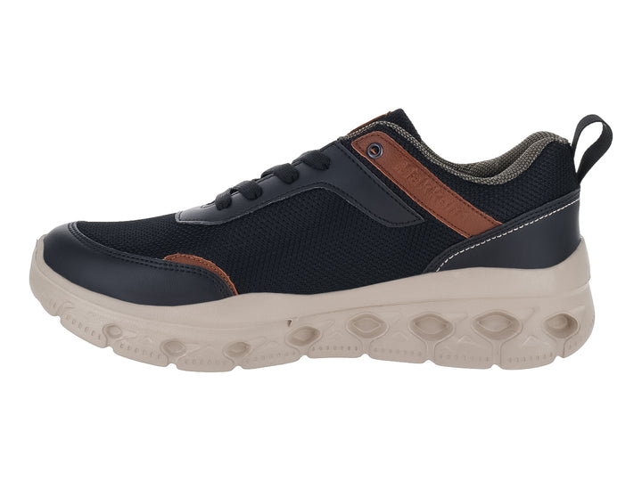 Tenis MAKENA color negro y café con suela beige gruesa y detalles en malla.