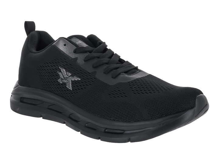 Tenis deportivos color negro con malla transpirable y suela gruesa.